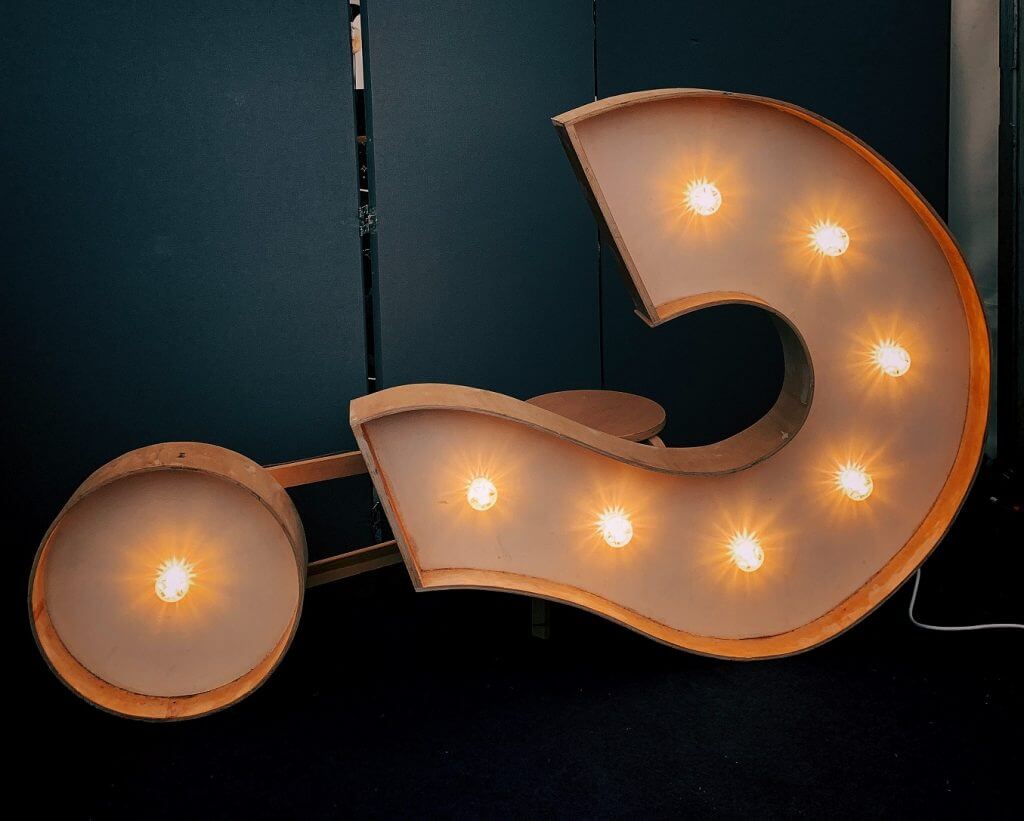 An image of a custom question mark sign lit up