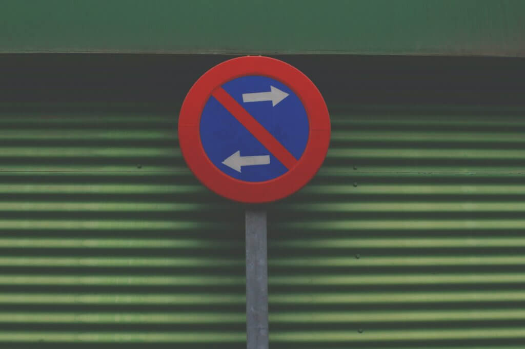 Mixed signals on a sign representing signals sent to search engines